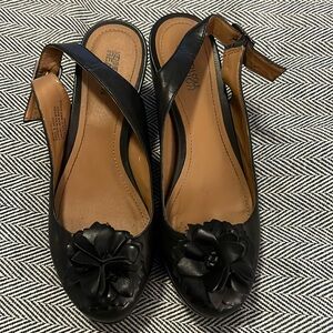 Kenneth Cole Reaction Sling-back wedge platforms. All leather w/ flower detail.